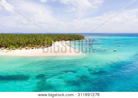 Seascape With A Beautiful Island. Daco Island, Philippines. Tropical Island With A White Sandy Beach