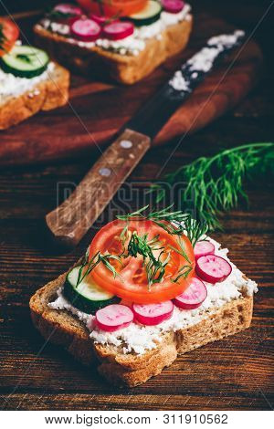 Vegetarian Sandwiches With Fresh Sliced Tomatoes, Cucumber And Radish