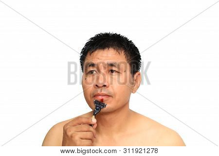 Man Having Accident From Shave On Shin