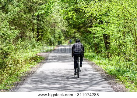 Biking In Spring Forest At Asphalt Road. Gaderska Valley In Slovakia