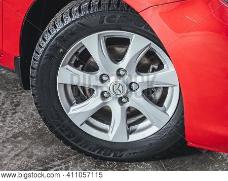 Novosibirsk, Russia - March 03 2021: Mazda 3, Car Wheel With Alloy Wheel And New Rubber On A Car Clo