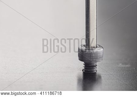 Hex Wrench Screw Hex Bolt In Metal Steel Plate. Spanner, Bolt, Screw And Nuts.