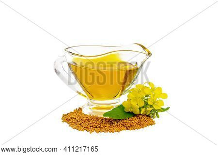 Oil Mustard In Gravy Boat With Seeds And Flower