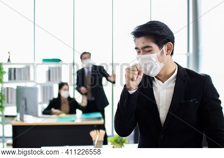 Business Workers Wear Masks To Protect And Take Care Of Their Health.young Asia  Business Man Feeeli