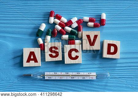 Ascvd (atherosclerotic Cardiovascular Disease) - Acronym On Wooden Cubes On A Blue Background With T