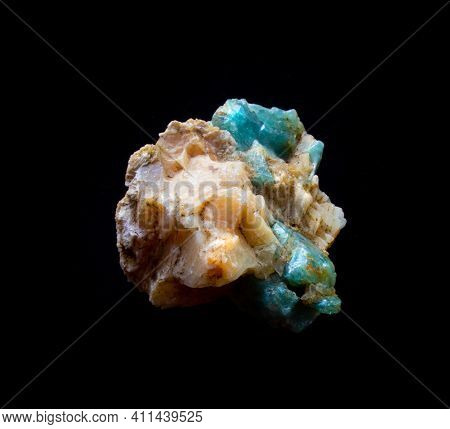 Aquamarine Gemstone Crystal Inside Feldspar Rock Isolated On Black. For Geology Mineralogy Magazines