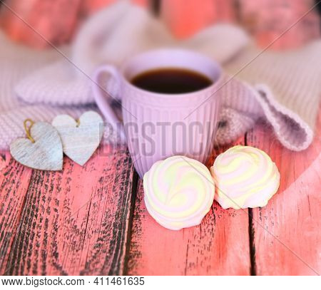 Cozy Stiil Life With Cup Of Coffee, Warm Plaid,  Hearts And Marshmallow. Pink Wooden Background. Haz