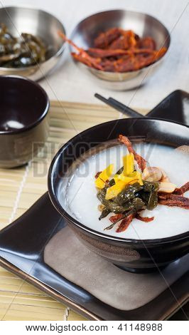 congee with dried beef, peanuts, preserve turnips and sea weeds