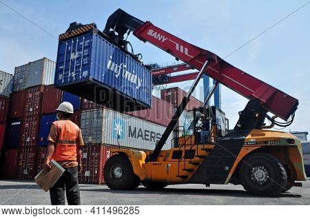 Jakarta, Indonesia - May 6, 2017: Container Unloading Truck In Logistics Yard At The Port Of Tanjung
