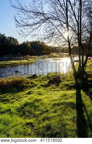 Sunny Landscape With Rays Of Sun, River With Water And Grass In Winter Sunrise. Gredos, Avila.
