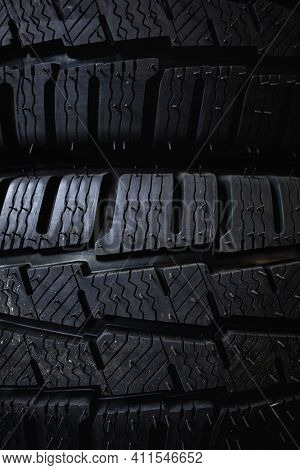 Tires Close Up. Black Studdable Winter Tyre Profile.