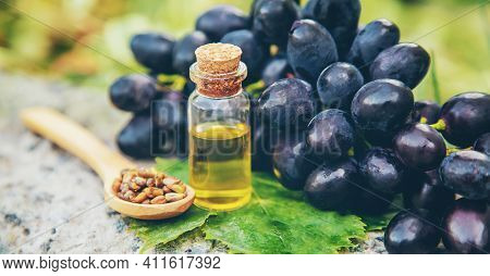 Grape Seed Oil In A Small Jar. Selective Focus.