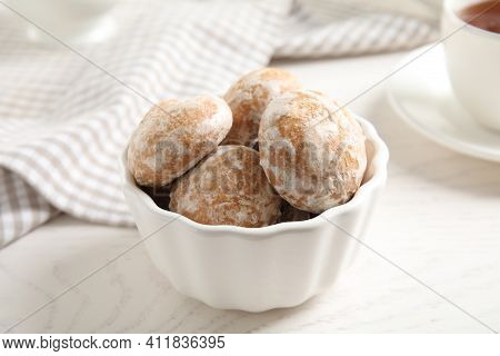 Tasty Homemade Gingerbread Cookies In Bowl On White Wooden Table
