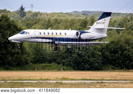 Cessna 680 Citation Sovereign Corporate Business Jet Arriving At Eindhoven Airport. The Netherlands 