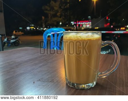 Selective Focus Of Tea With Milk In A Mug Or Popularly Known As Teh Tarik On The Table