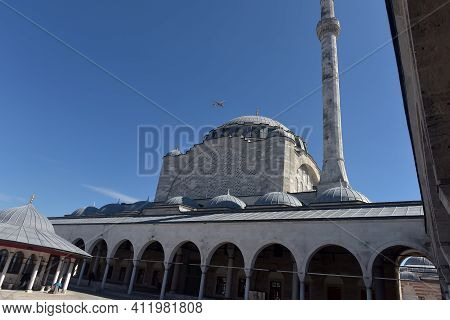 Turkey, Istanbul 14,03,2018 Mihrimah Sultan Mosque In Uskudar District. Muslims And Tourists Walk Th