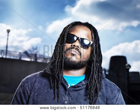 african man in urban portrait.