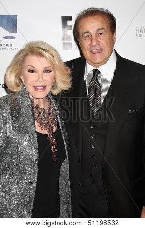 LOS ANGELES - SEP 19:  Joan Rivers, Larry Thompson at the Heller Awards 2013 at Beverly Hilton Hotel on September 19, 2013 in Beverly Hills, CA