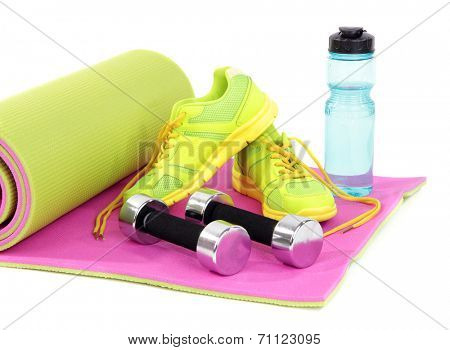 Sport requisites on a carpet isolated on white