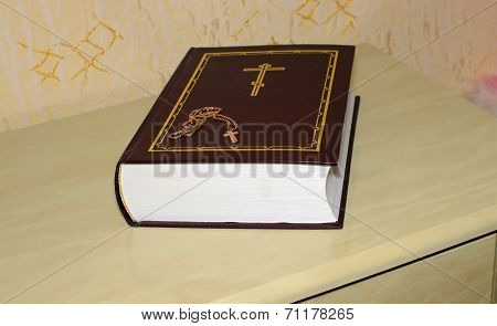 Bible And A Gold Cross And Chain