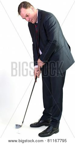 Business man playing golf
