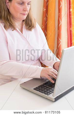 Businesswoman working with laptop