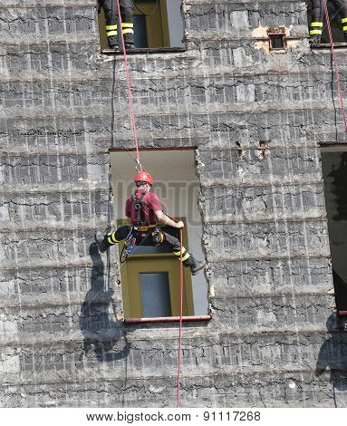 Climber Of Firefighters During Exercise At Fire Station Department