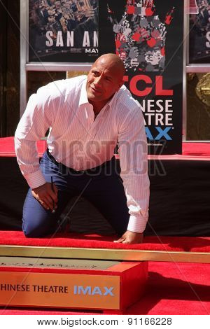 LOS ANGELES - MAY 19:  Dwayne Johnson, The Rock at the Dwayne Johnson Hand and Foot Print Ceremony at the TCL Chinese Theater on May 19, 2015 in Los Angeles, CA