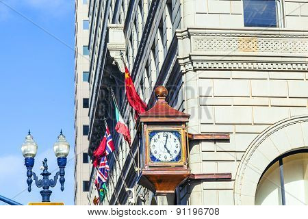 Facade With Old Clock In The Gaslamp Quarter In San Diego