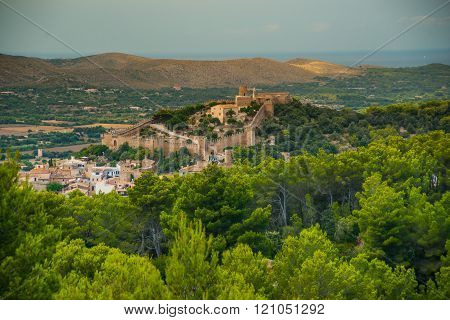 Capdepera castle on green hill in Mallorca