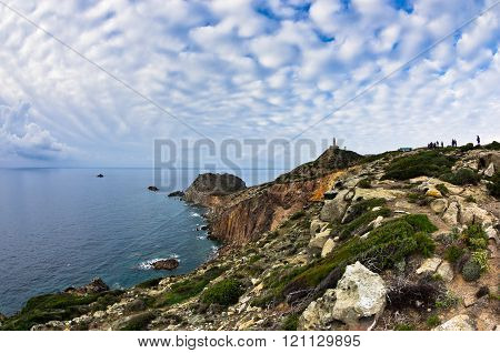 Lighthouse at Capo Sandalo on west coast of San Pietro island, Sardinia