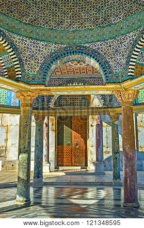 The view on the side door of the Dome of the Rock through the columns and arches of the Dome of the Chain Jerusalem Israel.