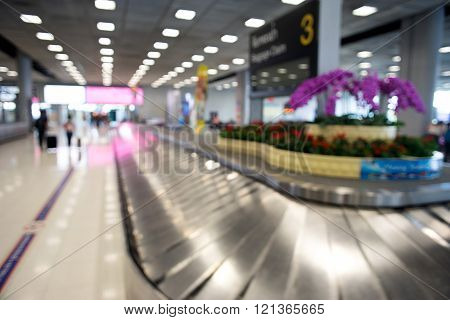 Blur luggage claim belt
