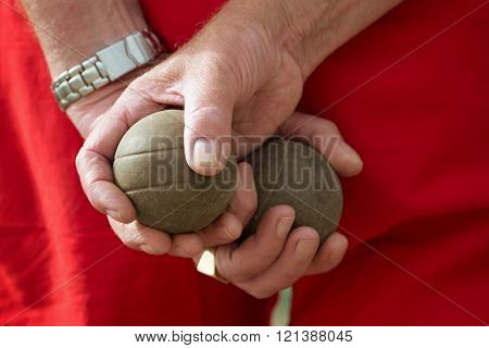Senior playing petanque