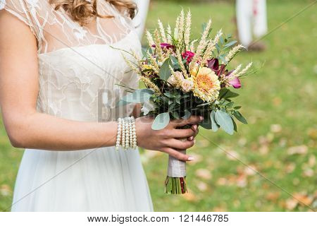 Bride with wedding bouqet