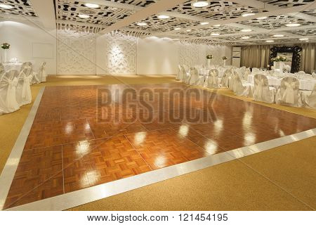 dancing floor in wedding ballroom in hotel interior