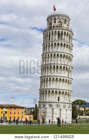 Piza, Italy - 10 March, 2016: View Of Leaning Tower And The Basilica, Piazza Dei Miracoli, Pisa, Ita