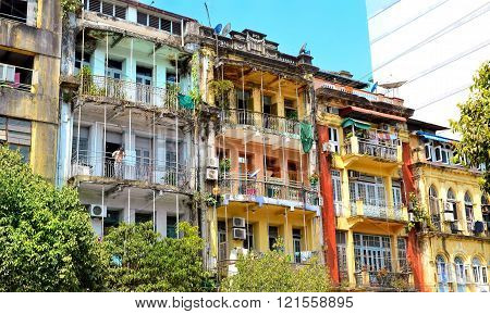 Yangon Myanmar - March 9 2015: A street archtecture view with colonial building in the town of Yangon