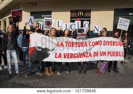 VALENCIA, SPAIN - MARCH 14, 2016: Unidentified protesters in an anti bullfighting demonstrating in the streets of Valencia. Bullfighting currently takes place in nine countries around the world.