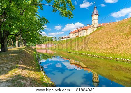 NESVIZH, BELARUS - August 18, 2015: Nesvizh castle reflected in the water