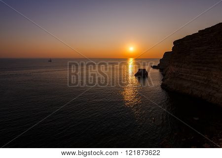 Sunset on the rocky seashore Cape Fiolent Crimea