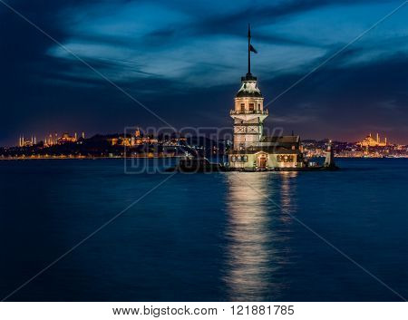 Maiden's Tower and The Old Town  with Topkapi Palace and Mosques at night in Istanbul Turkey