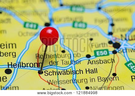 Photo of pinned Schwabisch Hall on a map of Germany. May be used as illustration for traveling theme.