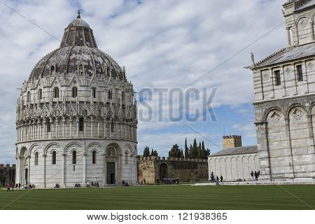 Piza, Italy - 10 March, 2016: View Of Leaning Tower And The Basilica, Piazza Dei Miracoli, Pisa, Ita