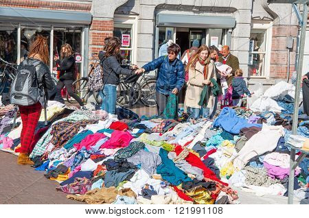 Amsterdam-April 30: Clothing in a sale on daily Flea market Waterlooplein (Waterloo Square) on April 30 2015 the Netherlands.