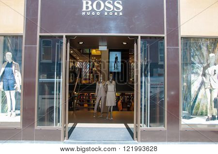AMSTERDAM-APRIL 30: Boss store in the P.C.Hooftstraat shopping street on April 302015 in Amsterdam. The German luxury fashion and style house was founded in 1924 by Hugo Boss.