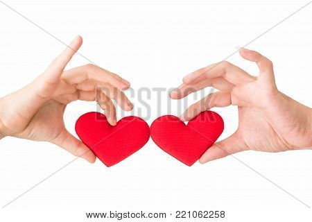 Handsome man showing engagement diamond ring to beautiful girlfriend with copy space for text. Couple dress red traditional cheongsam costume. 2018 Chinese new year with surprise Marriage Proposal.