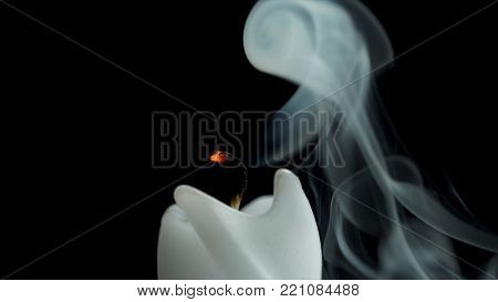 White Long Candle On Black Background. Single Candle Flame Light .long Flame , Old Candle .white Can