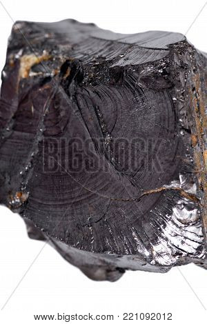 Rough lustrous elite shungite from Russia isolated on white background