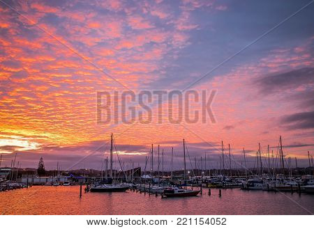 yachts and ships in marina at sunset, ahuriri, napier, new zealand
